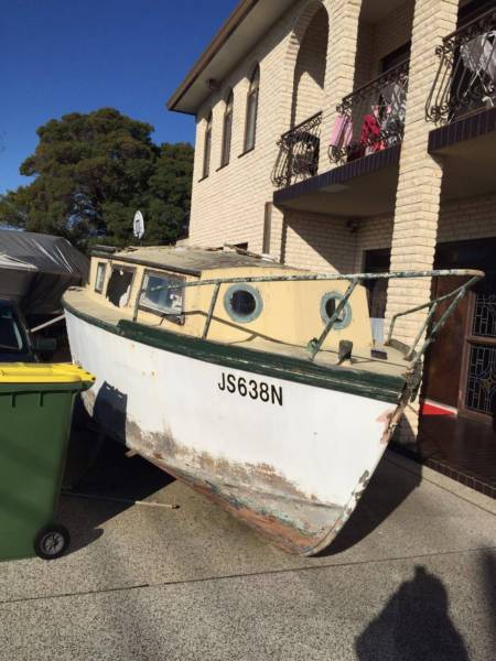 9 meter long wooden boat