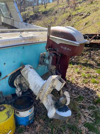 older chris craft style boat with engine