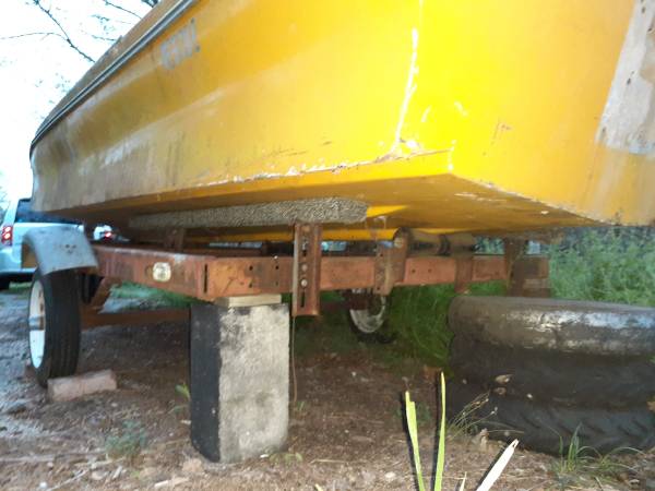 trailer with scrap boat