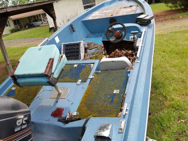  1985 craft boat on trailer.
