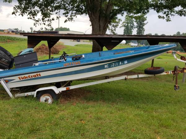 Transom broken. Motor needs work not running is complete.