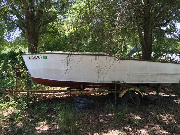 Old homemade wooden boat. Needs work to be sea worthy.