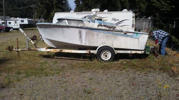 Boat and trailer white and blue