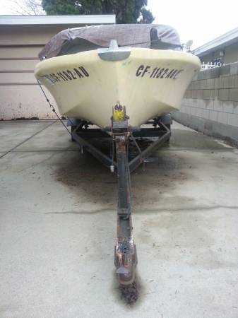 1960 project boat hull with trailer