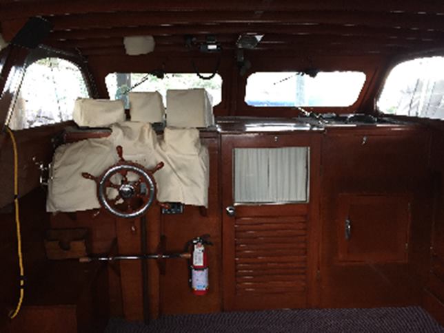 35’ classic wood hull cabin cruiser cockpit