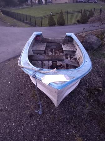 blue boat shell bow to stern
