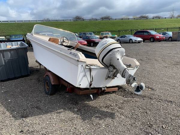 Boat with outboard 