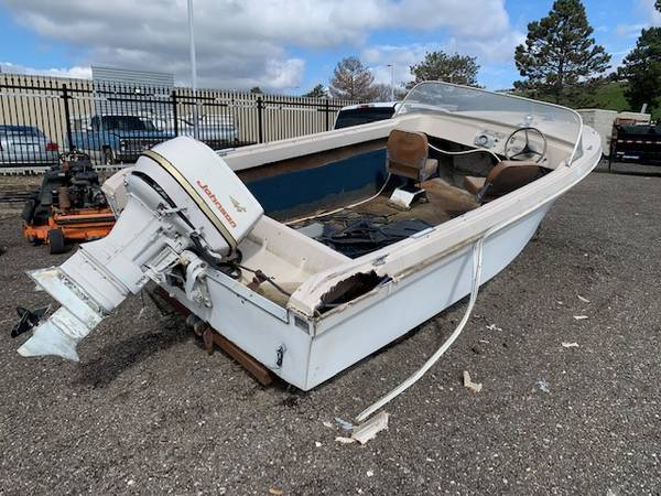 boat on trailer with Johnson Outboard
